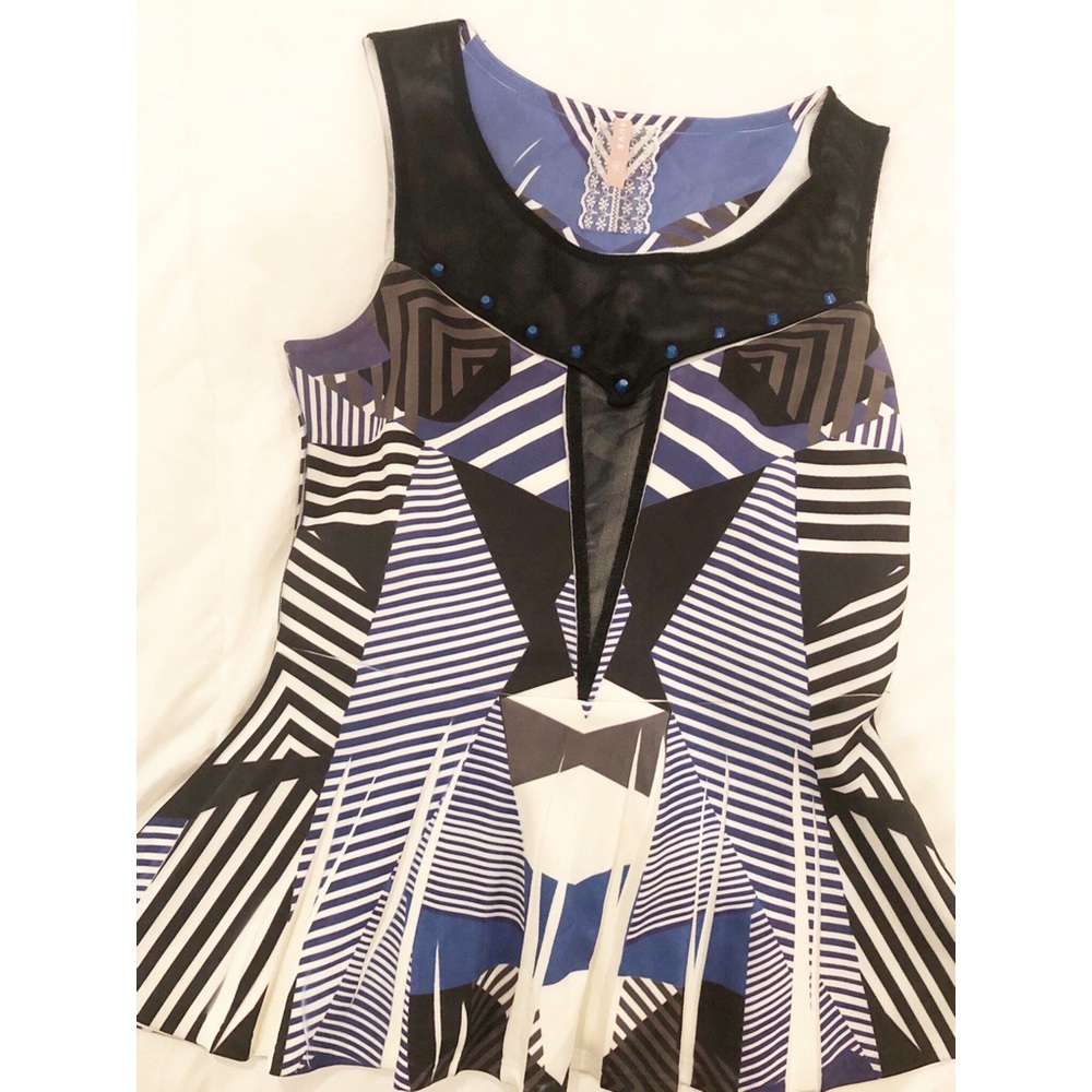 Anthropologie Mauve Peplum Top